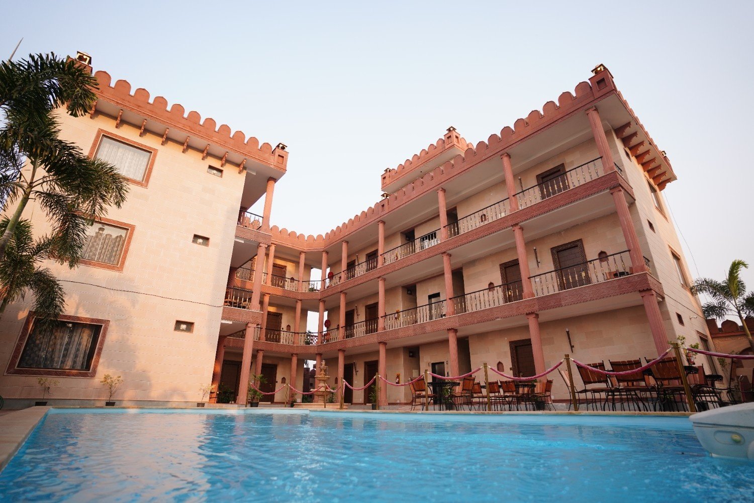 The Fort hotel building and swimming pool courtyard